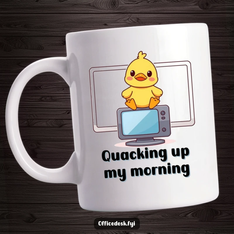 Funny mug featuring a small rubber duck character perched on a monitor, looking very amused.