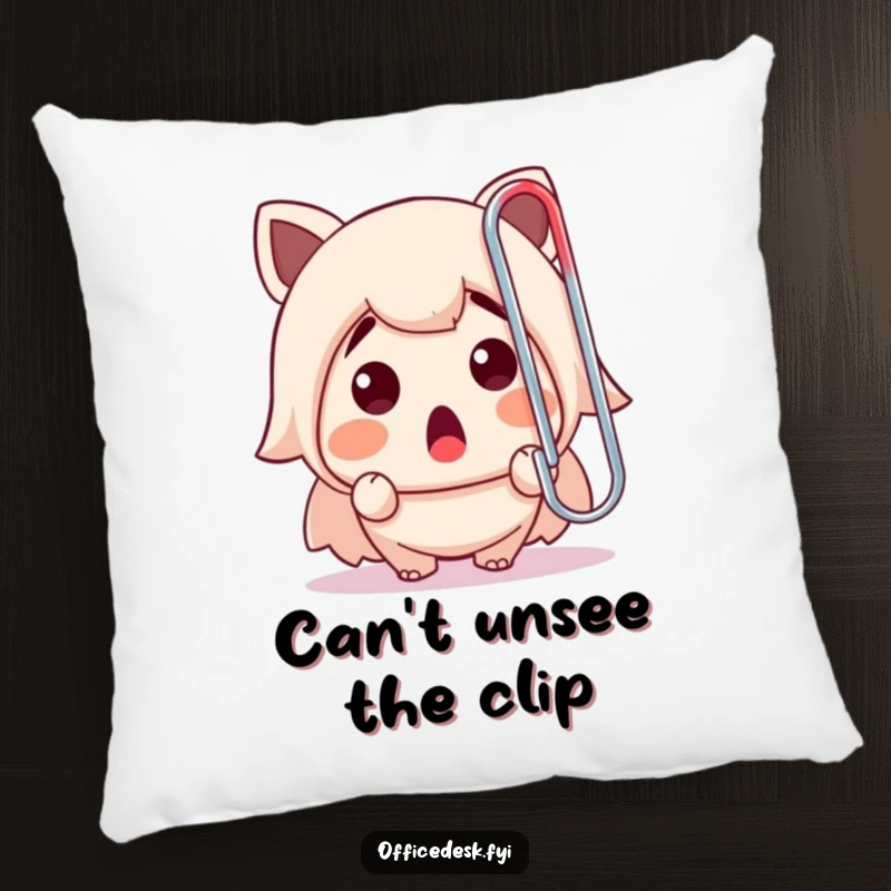 Funny pillow with a cute character gasping at a giant paperclip, bringing office-themed humor and comfort to any room.