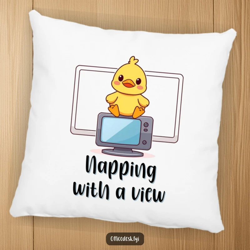 Funny pillow with a small rubber duck perched on a computer monitor, looking highly amused.