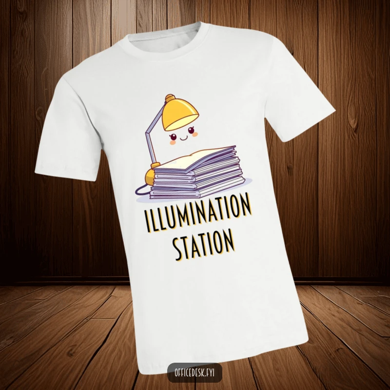 Funny desk lamp t-shirt, a miniature grinning lamp character beaming light onto a messy stack of papers, work humor.